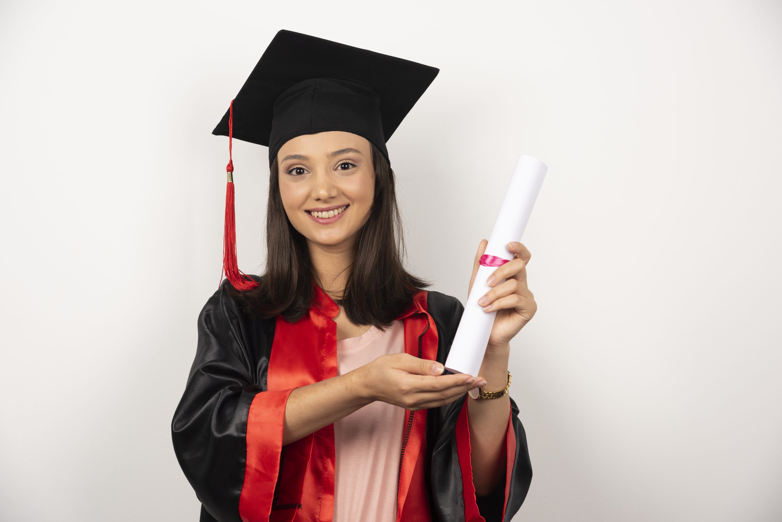 Female student showing diploma on white background. High quality photo